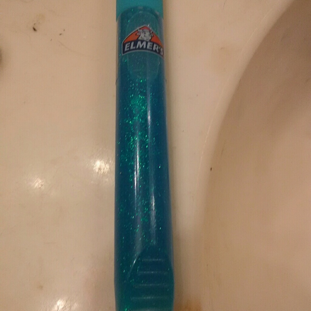 Light blue glitter glue pin